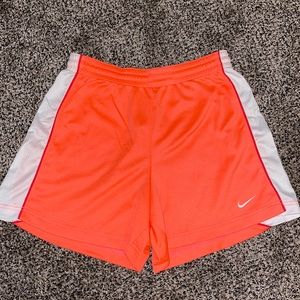 Coral Nike shorts